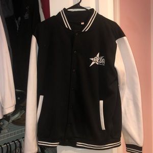 Reach the beach cheer national champ jacket